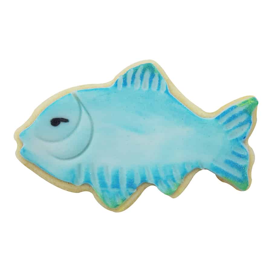 Decorated fish-shaped sugar cookie with light blue icing, painted details, and a black icing eye.