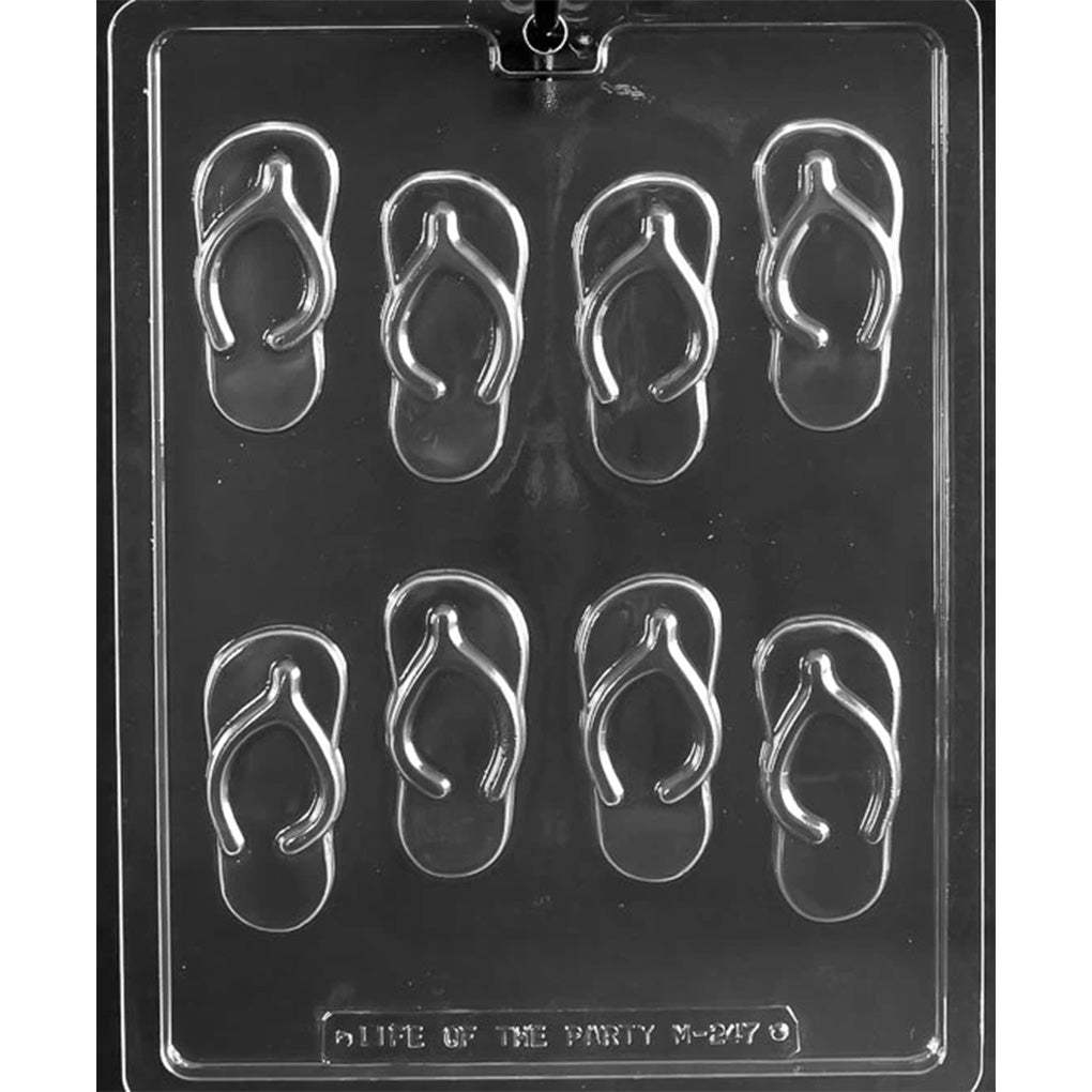 Clear plastic chocolate mold tray with eight flip-flop shaped cavities featuring raised straps and a ribbed sole pattern.