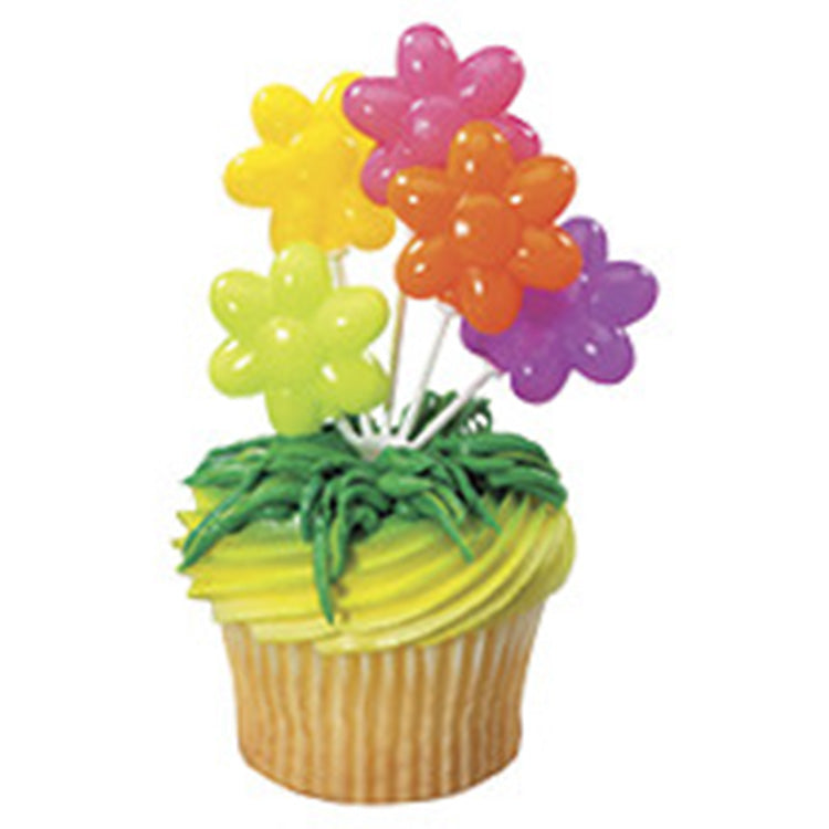 Cupcake with yellow frosting and green piping topped with a multi-color Flower Balloons DecoPics pick featuring five bright flower-shaped balloons.