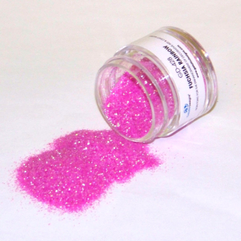 Open jar of Fuchsia Rainbow Galaxy Glitter Dust with bright pink sparkling dust spilled onto a white background.