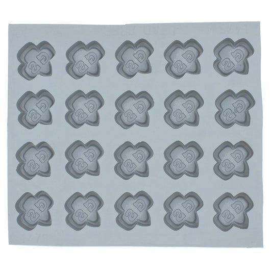 Full Girl Scout emblem rubber mint mold sheet featuring multiple trefoil-shaped cavities for themed mints or chocolates
