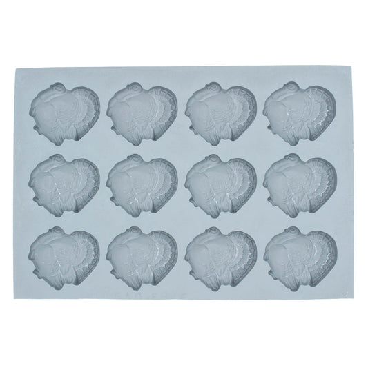 Full sheet of 12 rubber turkey molds, ideal for crafting large mints or chocolates for fall celebrations.