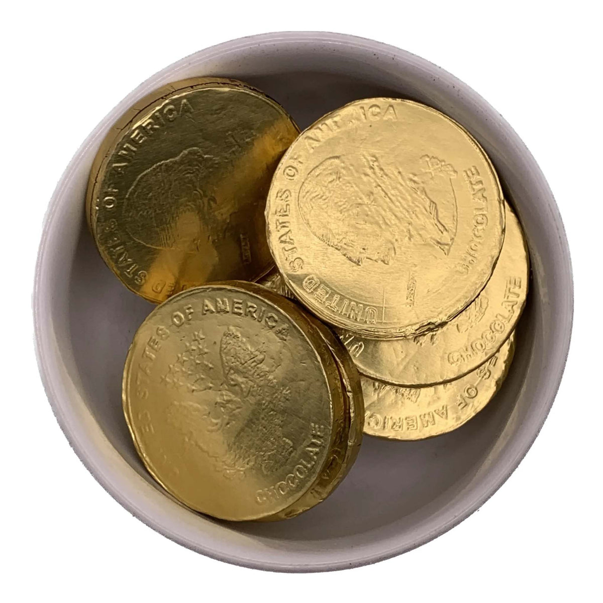 White bowl filled with round chocolate coins wrapped in gold foil and embossed with George Washington, an eagle, and United States coin lettering.