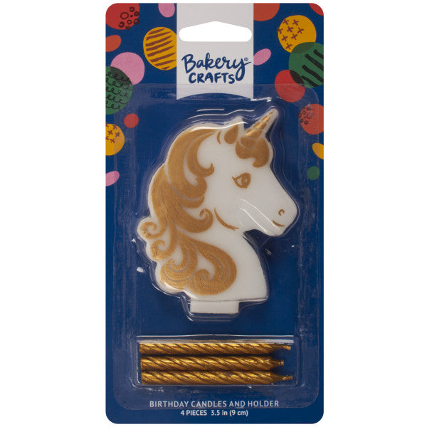 Packaged Bakery Crafts golden unicorn candle holder set showing a white unicorn head holder with gold details and three gold spiral candles inside a blue blister card.