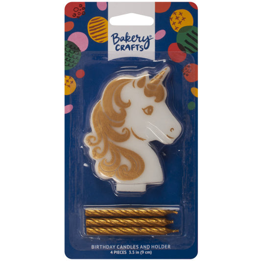 Packaged Bakery Crafts golden unicorn candle holder set showing a white unicorn head holder with gold details and three gold spiral candles inside a blue blister card.