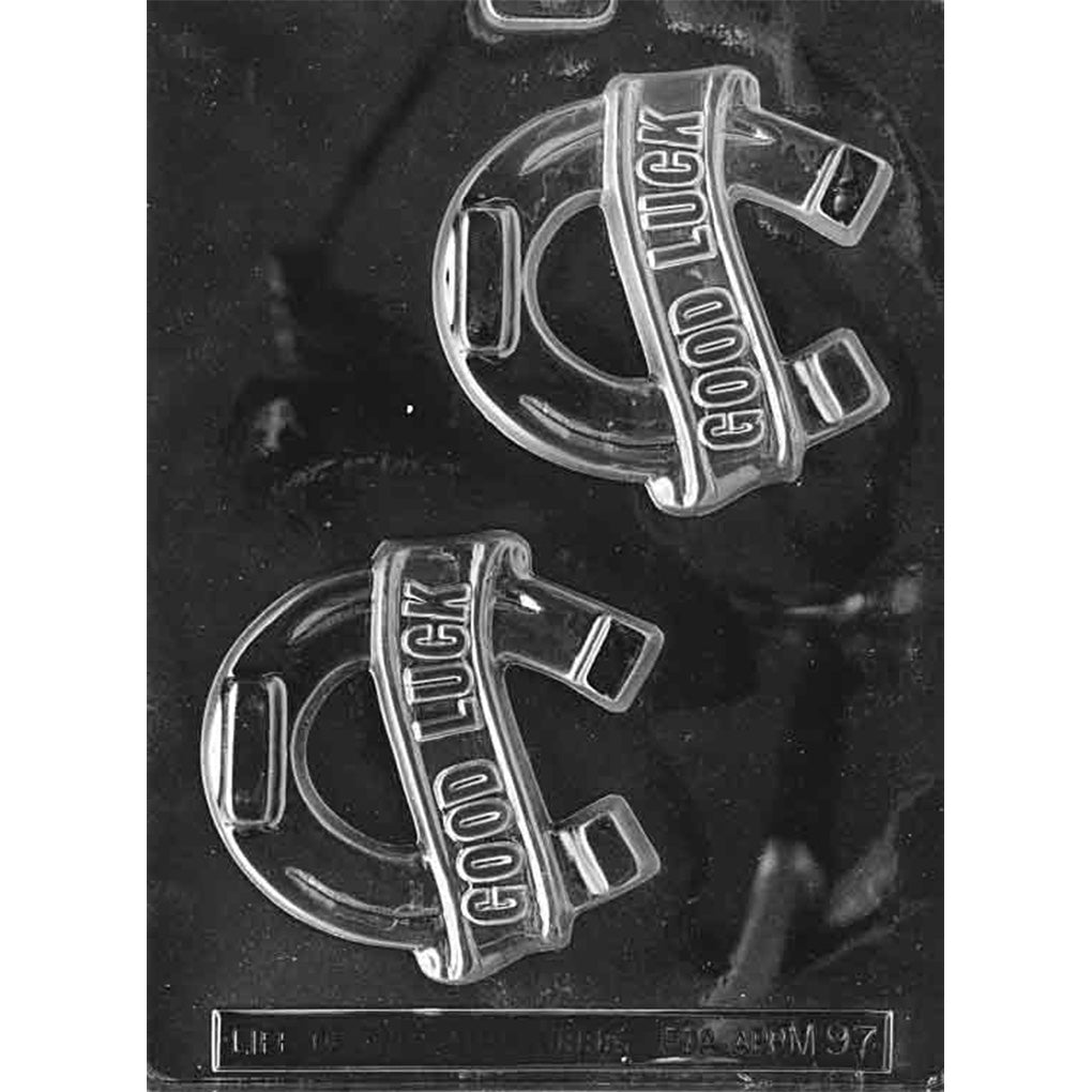 Good luck horseshoe chocolate mold with two large horseshoe cavities, each featuring a raised banner that reads “GOOD LUCK,” shown in clear plastic.