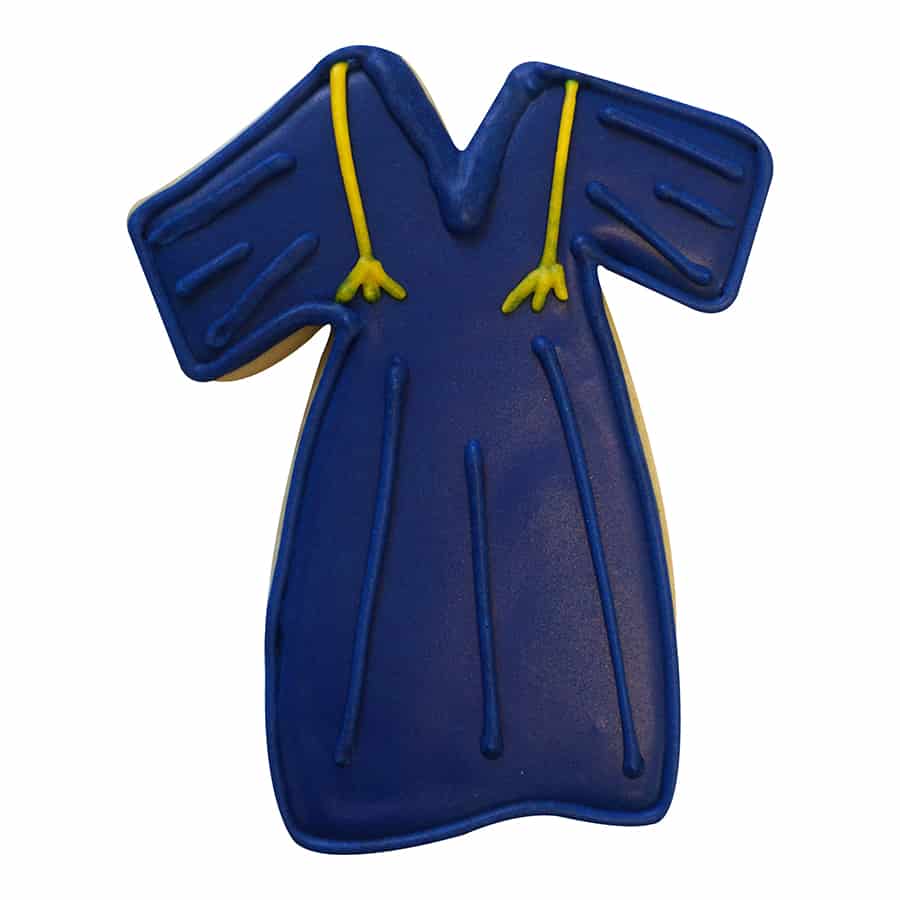 A decorated blue cookie shaped like a gown with yellow tassel details, resembling a graduation robe.