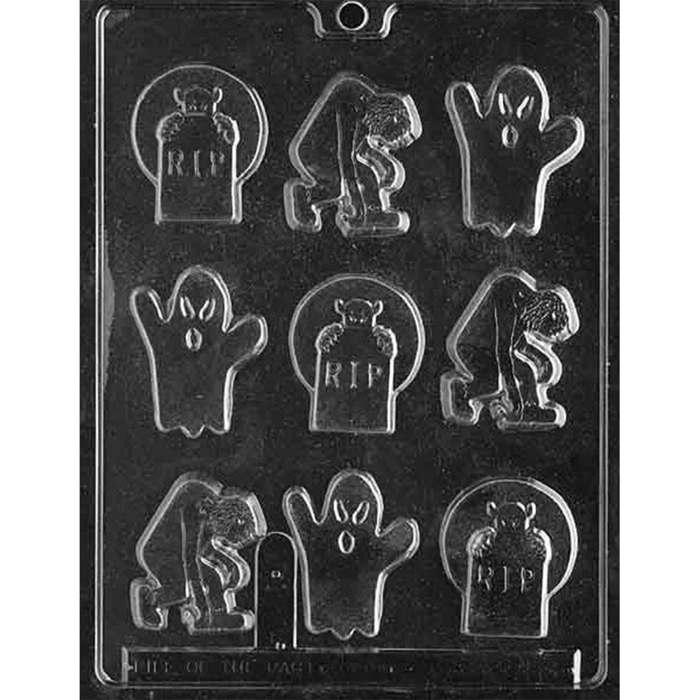 Clear Halloween chocolate mold photographed against a black background with nine cavities in assorted RIP grave, ghost, and hunched monster shapes.