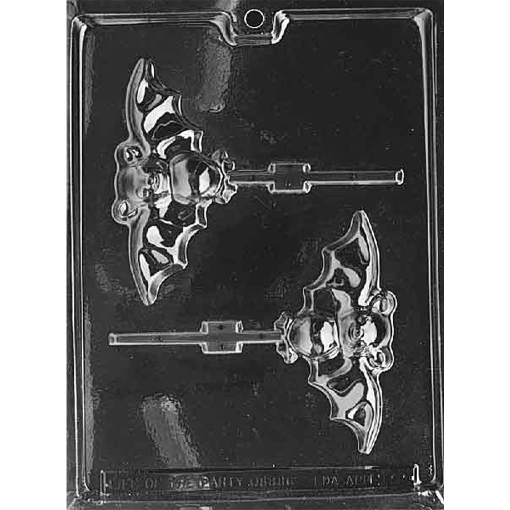 Clear plastic chocolate lollipop mold with two bat-shaped cavities, each showing spread wings, a round body, and a stick channel.
