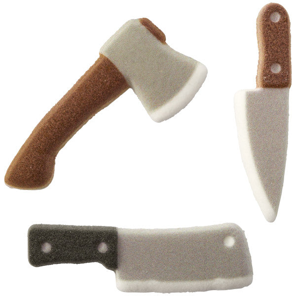 A set of three edible pressed sugar decorations shaped like an axe, cleaver, and knife, perfect for horror-themed desserts.