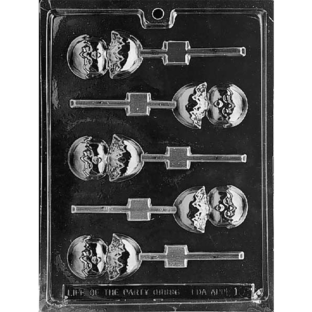Clear plastic chocolate lollipop mold with six cavities shaped like a chick hatching from a cracked eggshell, showing a round chick face above a jagged shell edge, each connected to a stick channel.