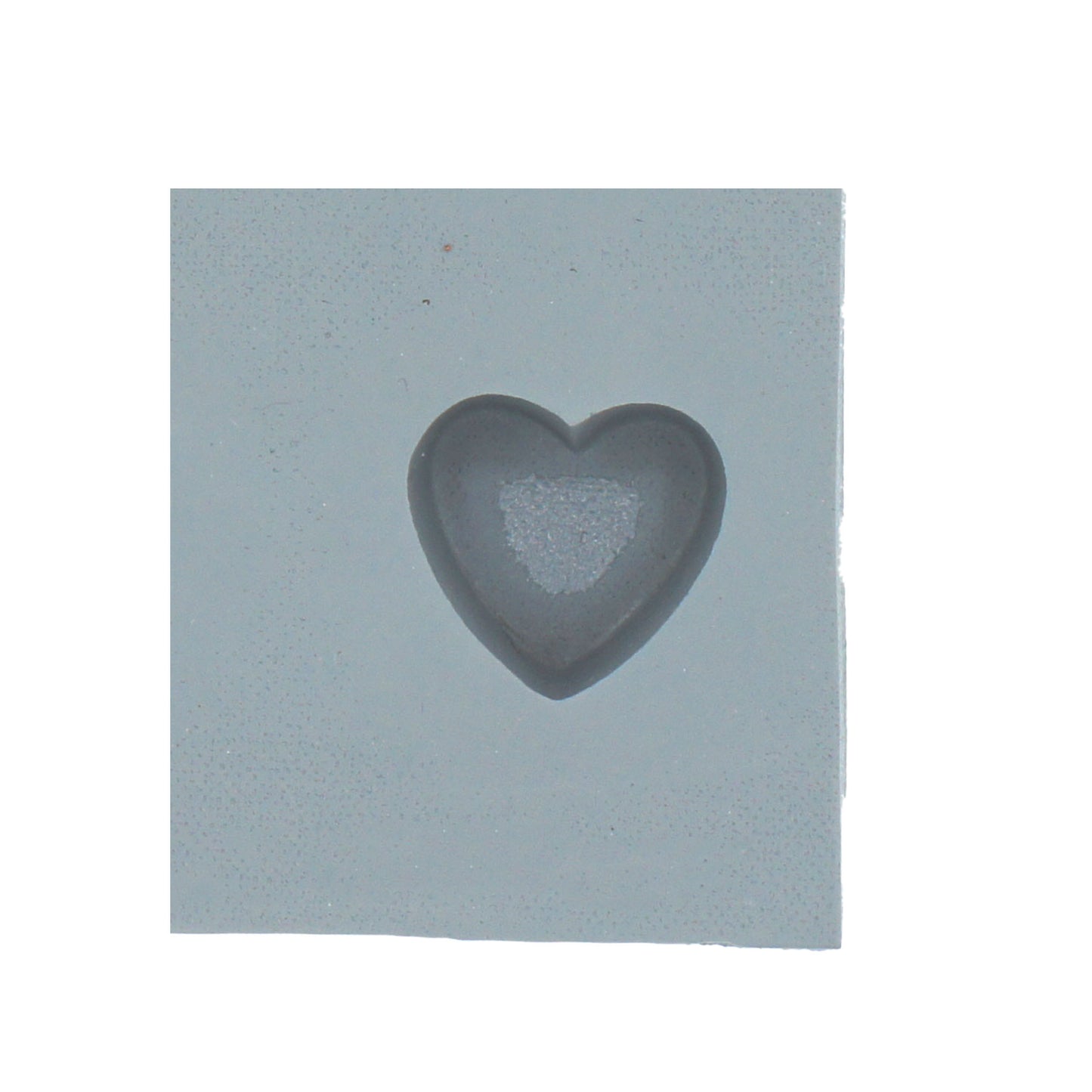Close-up of a single mini heart-shaped rubber mint mold cavity, ideal for bite-sized candies, chocolates, or cream cheese mints.