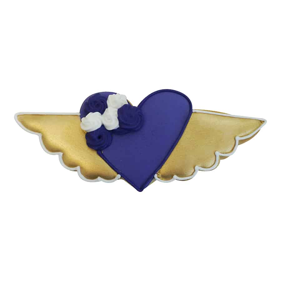 Decorated heart with wings cookie featuring a purple heart with gold wings and floral details.