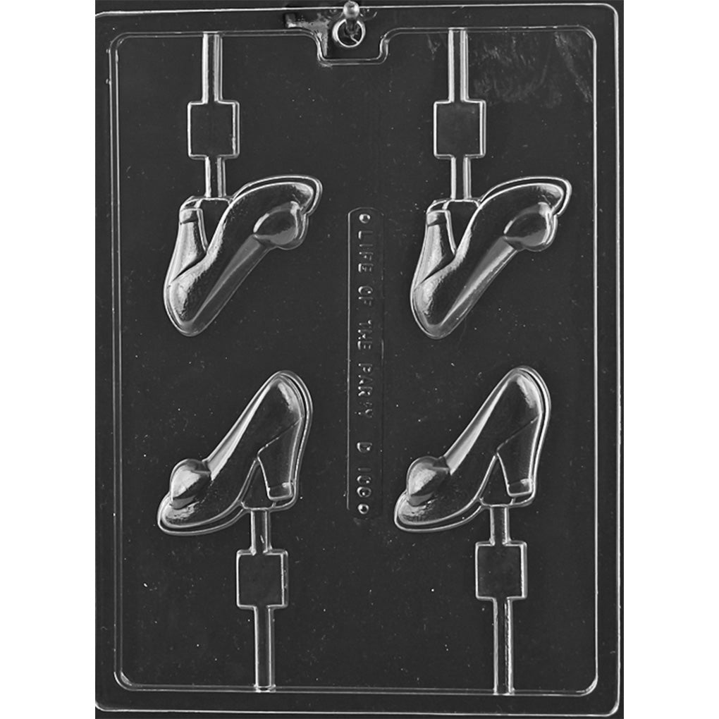 Clear plastic chocolate lollipop mold photographed on a dark background with four high heel shoe cavities, each paired with a long stick channel for molded chocolate pops.