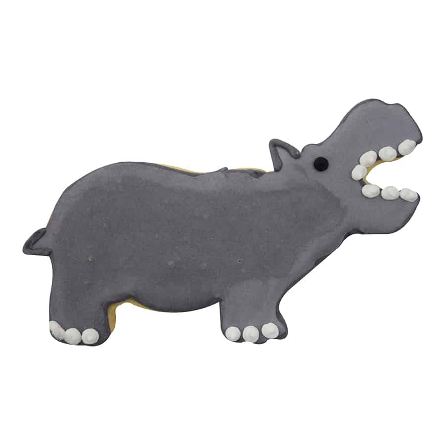 Decorated hippo cookie with gray icing, white feet, and an open mouth with white icing teeth.