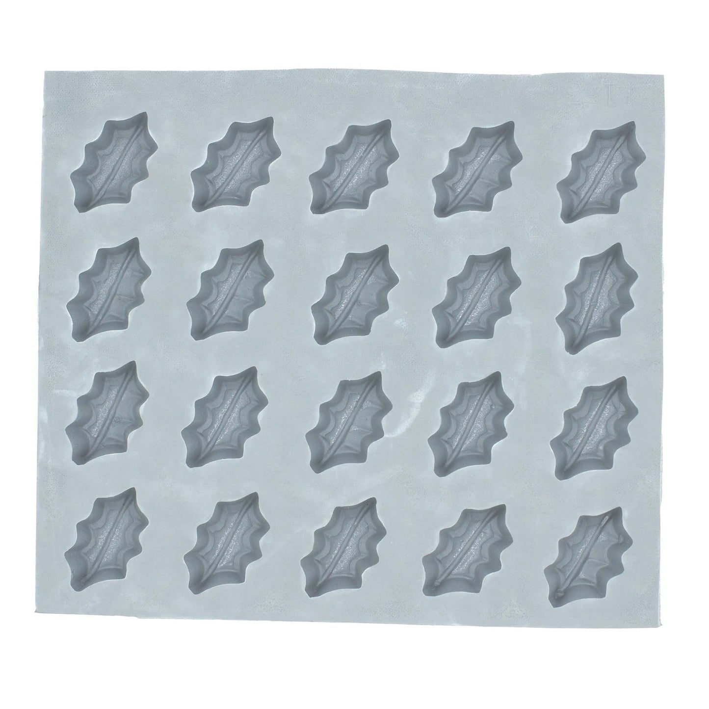 Full sheet of holly rubber mint molds with multiple festive leaf-shaped cavities for holiday candy making
