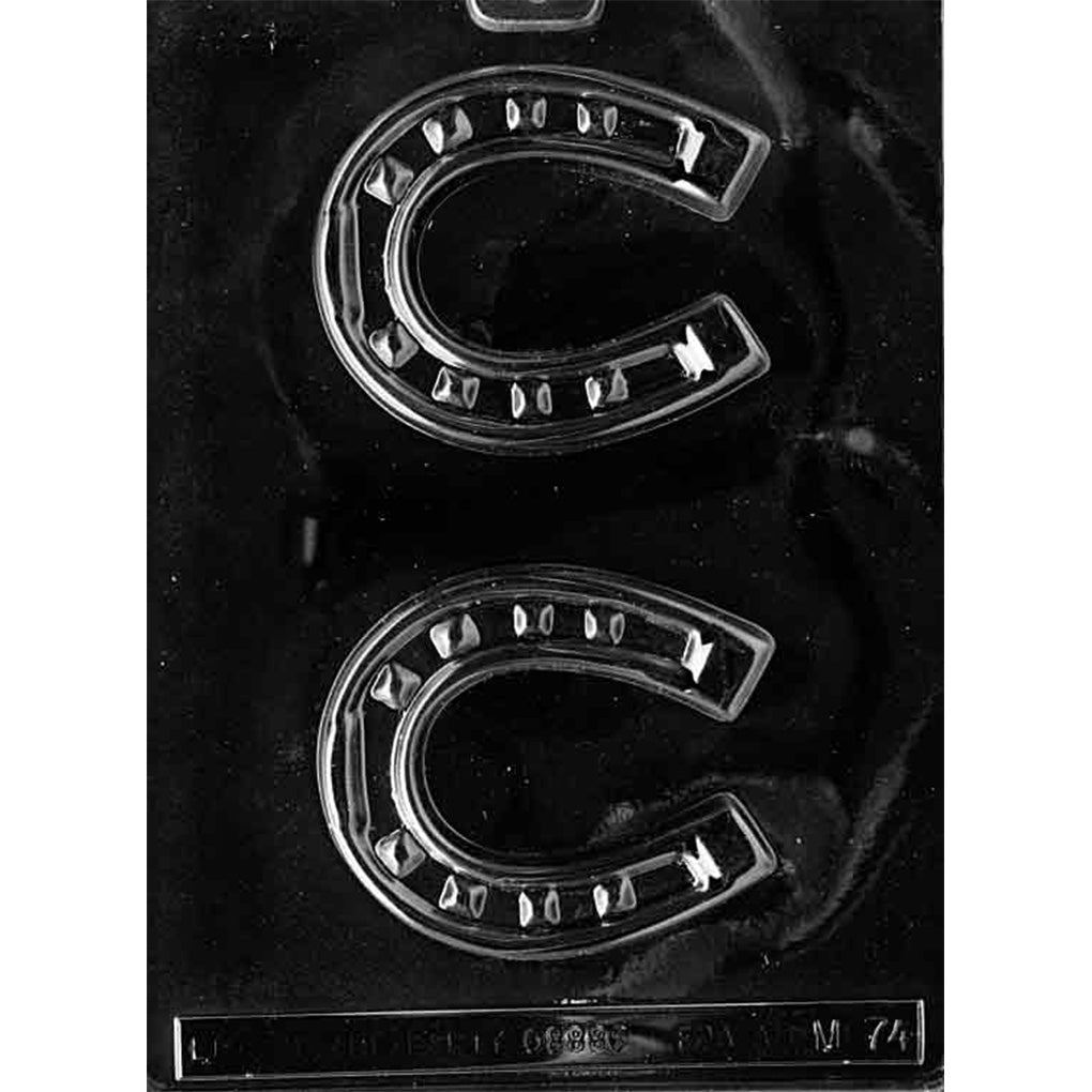 Plastic chocolate mold with two horseshoe-shaped cavities featuring small nail-detail impressions.