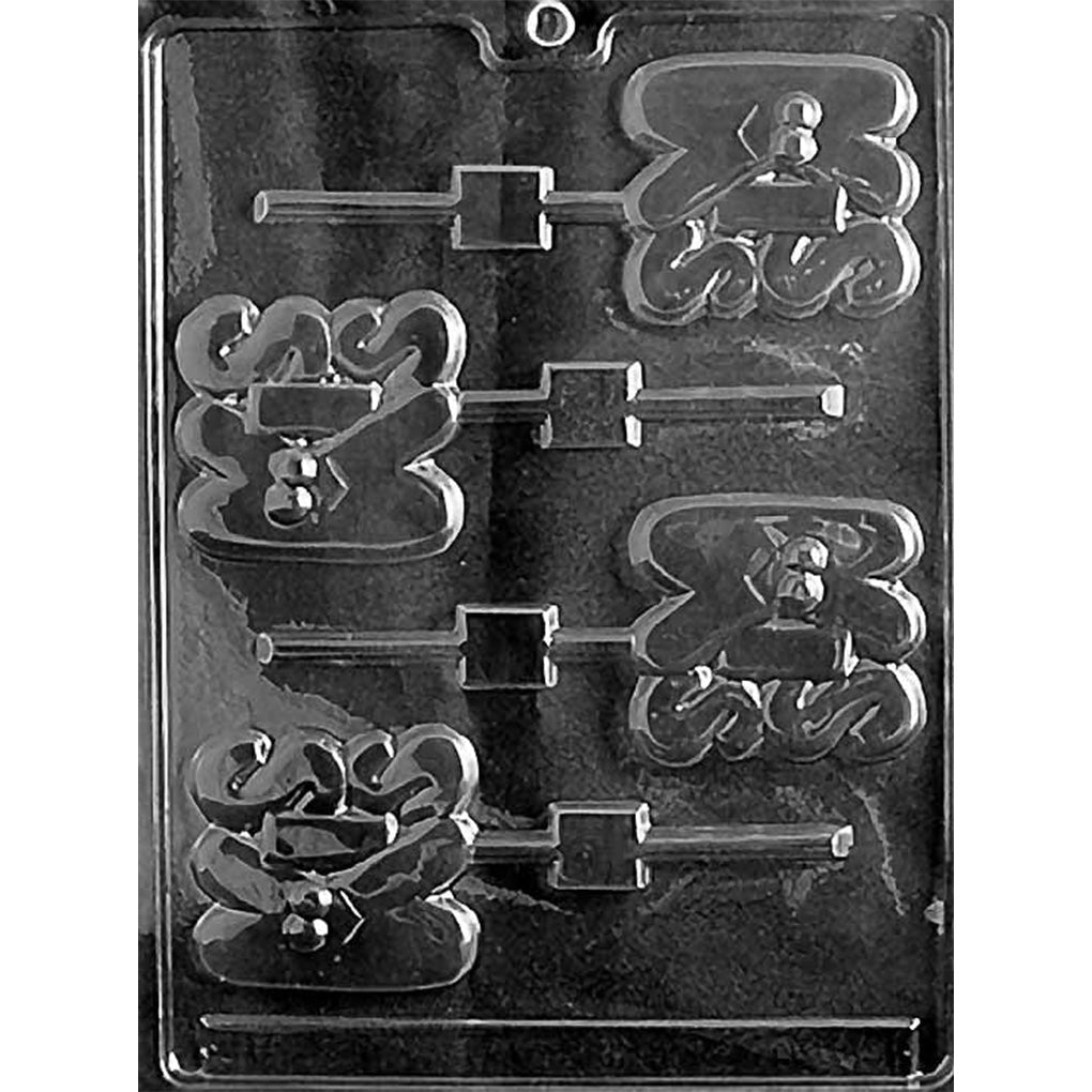 Clear plastic chocolate lollipop mold with four cavities shaped like the word “KISS” in rounded lettering, each with a small face detail and an attached stick channel.