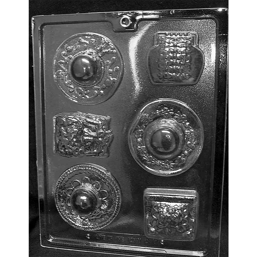 Ladies hats and handbags chocolate mold with six cavities featuring three decorative hat designs and three purse designs