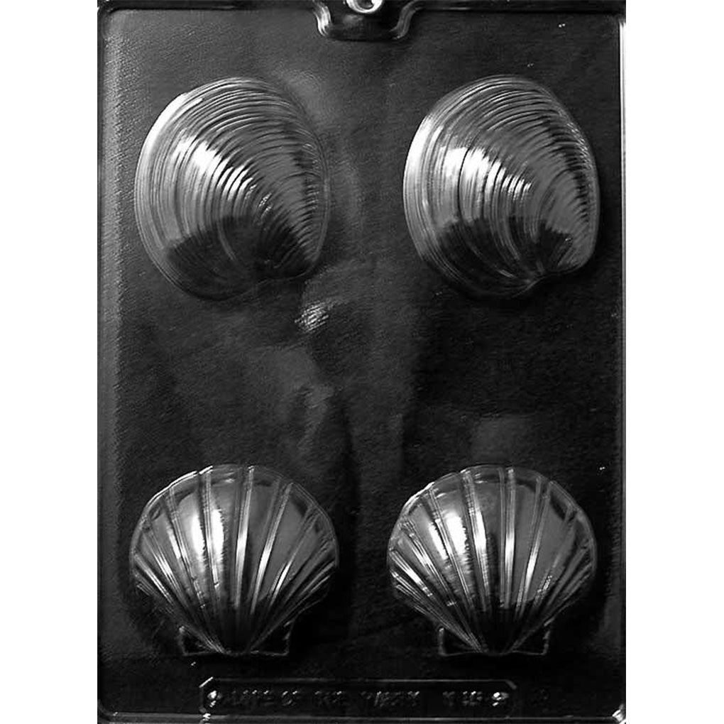 Four-cavity large shell assortment chocolate mold with two rounded ridged clam shells and two fan-shaped scallop shells; each cavity uses 1.6 to 2.2 ounces.