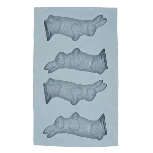 Full sheet of 4 large standing rabbit cavities in a natural rubber mold, used for creating vintage-inspired Easter or spring-themed treats.