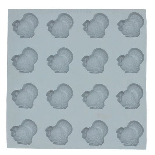 Top-down view of the full Medium Turkey Rubber Mint Mold sheet featuring 21 evenly spaced turkey-shaped cavities arranged in 3 columns and 7 rows, designed for holiday-themed treats