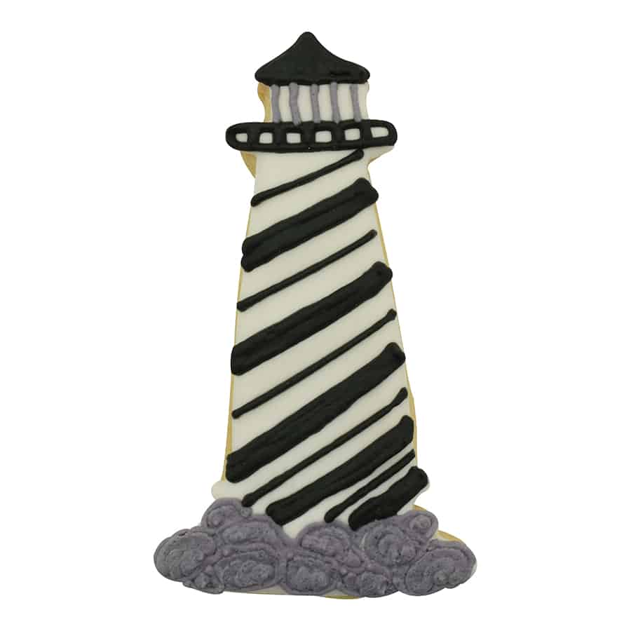 Decorated lighthouse cookie with black and white stripes and gray icing details.
