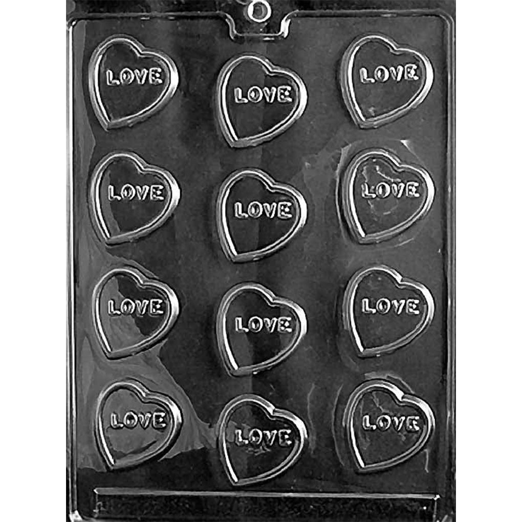 Clear chocolate mold with 12 small heart-shaped cavities arranged in rows, each featuring the word LOVE across the center.
