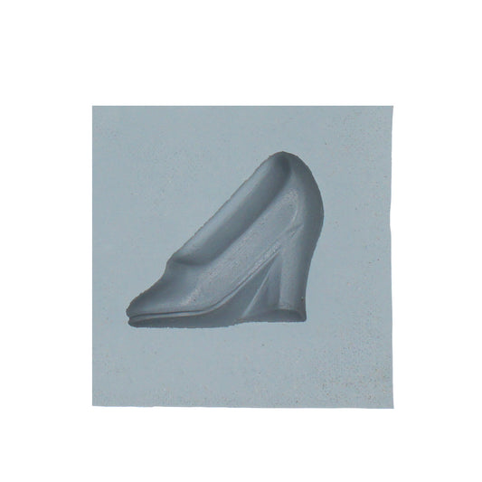 Close-up of low heel shoe rubber mint mold cavity featuring classic pump design for fashion or bridal-themed treats