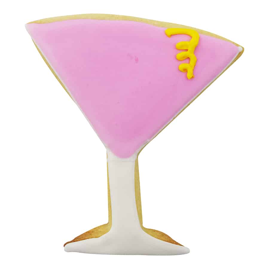 A decorated martini glass-shaped cookie with pink icing, made using the Martini Glass Cookie Cutter, showcasing a fun and elegant design.