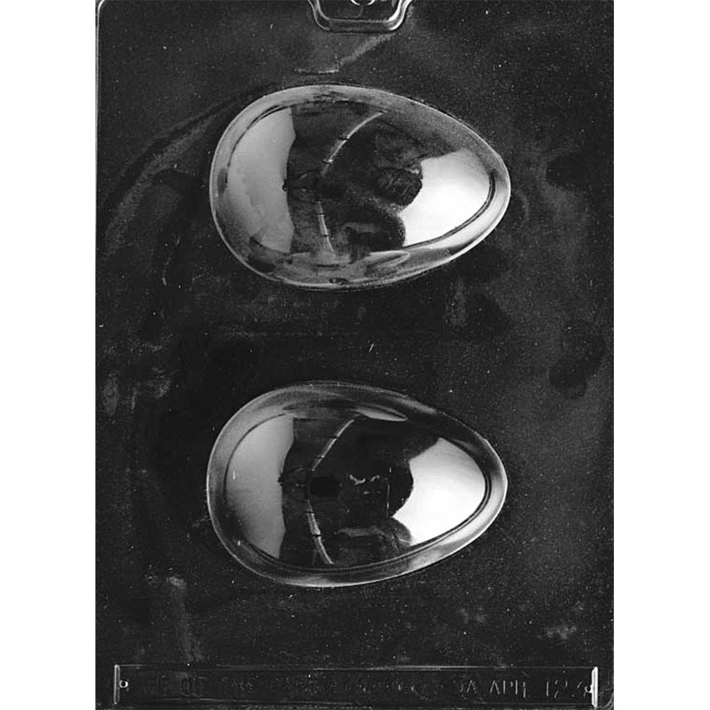 Clear plastic chocolate mold with two medium egg-shaped cavities for making hollow chocolate eggs.