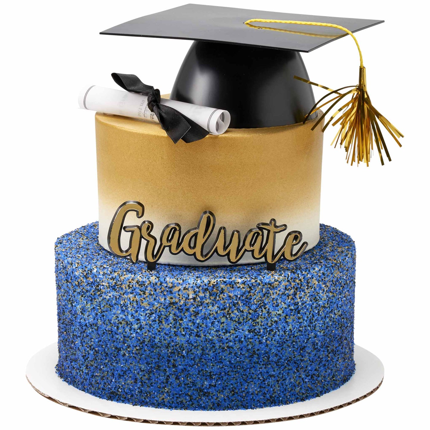 Tiered cake with a blue sprinkle-covered bottom tier and a gold-ombre top tier, finished with a black graduation cap and gold tassel, a rolled diploma tied with a black ribbon, and a gold “Graduate” script pick.