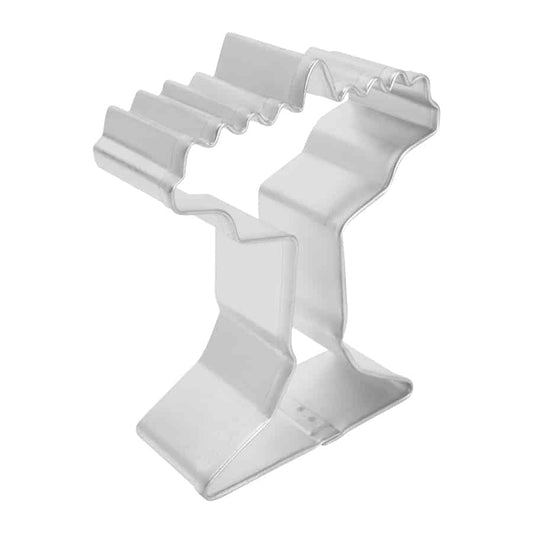 Side view of a menorah cookie cutter with a sturdy base and curved arms.