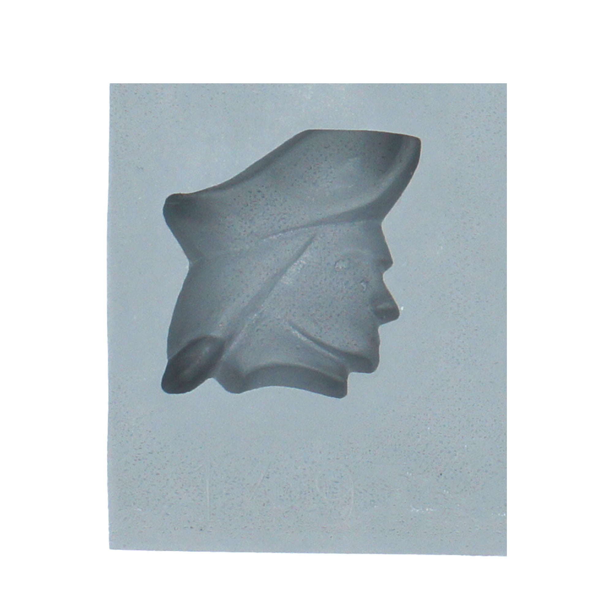 Close-up of Minute Man rubber mint mold with profile of Revolutionary War soldier wearing a tricorne hat