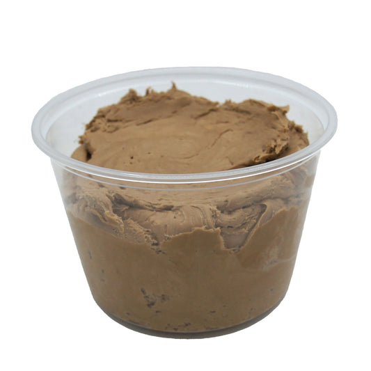 Clear plastic container filled with rich, light brown mocha candy center, smooth and ready to shape.