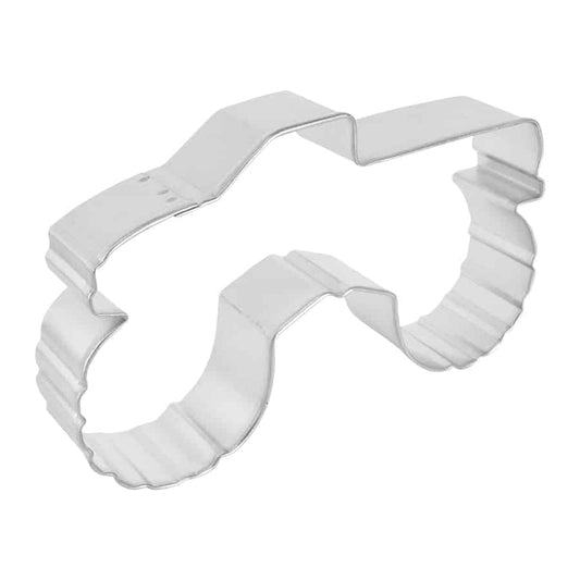 Side view of a monster truck cookie cutter featuring rugged wheel details.