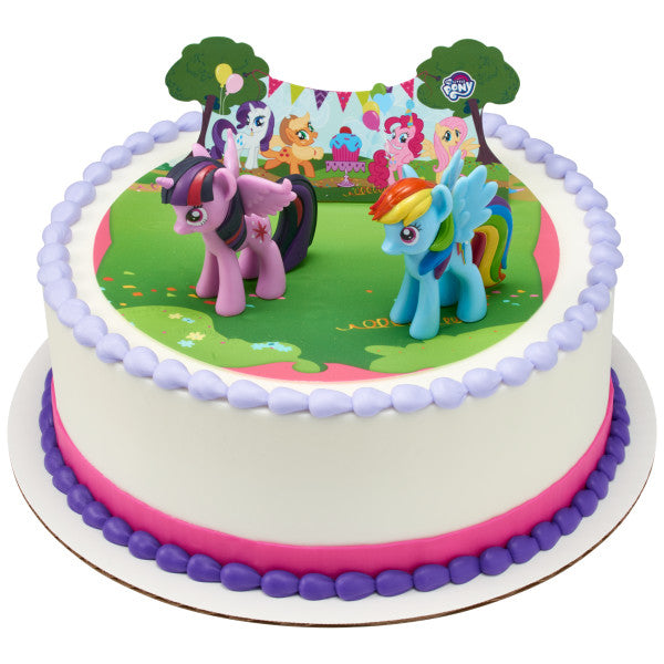 Round birthday cake with Rainbow Dash and Twilight Sparkle figurines and pony background