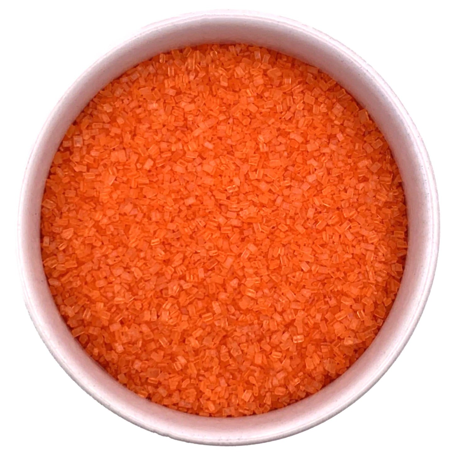 Top-down view of a white bowl filled with orange coarse sanding sugar crystals, showing bright orange, chunky granules packed closely together.