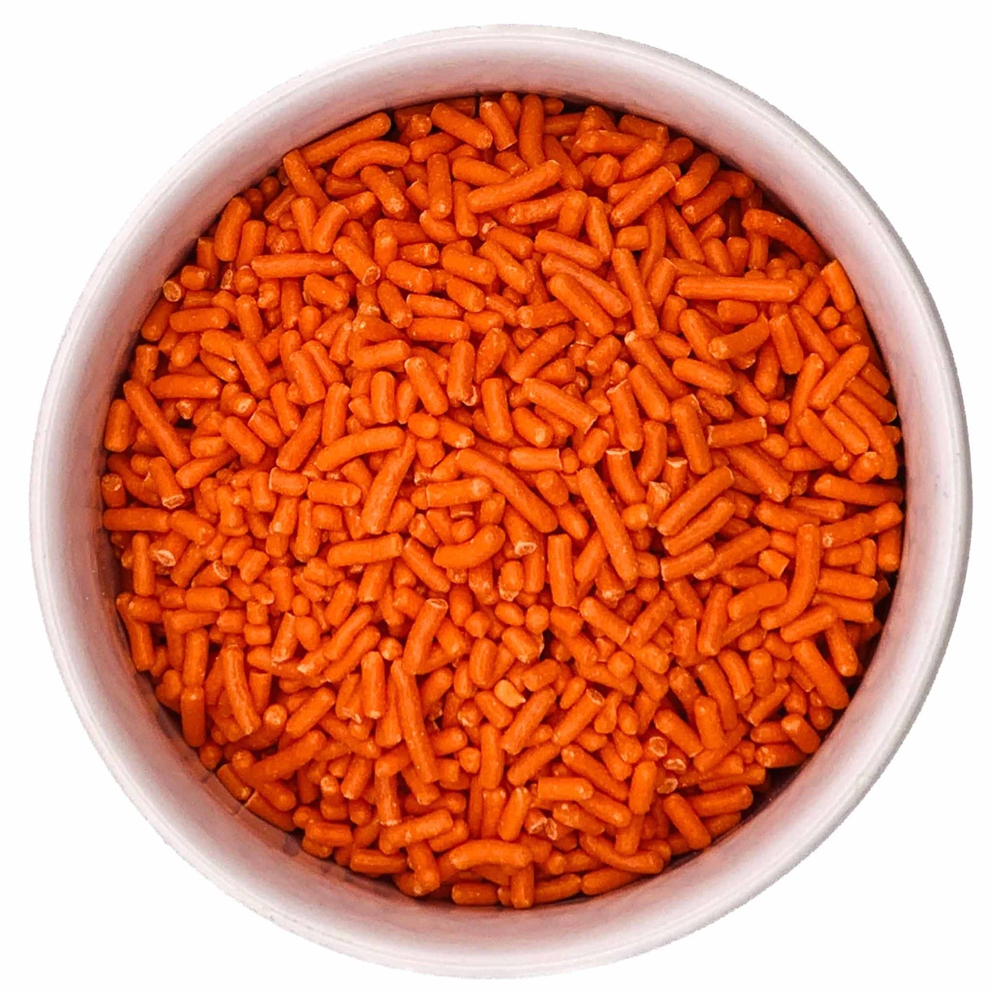 Top-down view of bright orange jimmies sprinkles in a white bowl, showing the classic rod-shaped sprinkle texture.