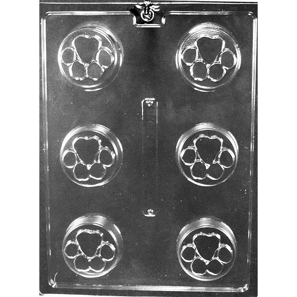 Clear plastic chocolate mold with six round cavities sized for chocolate covered Oreos, each cavity featuring a paw print design with a heart-shaped center pad.