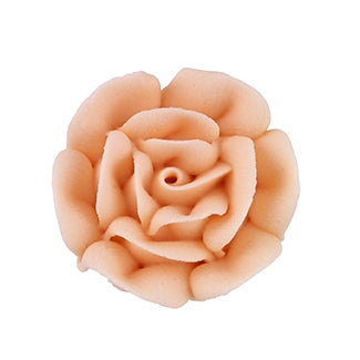 Peach royal icing rose with curled petals for cake decorating.