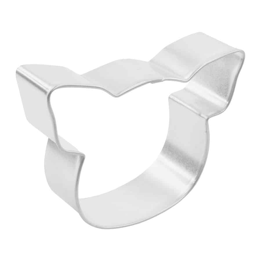 A side view of a pig-shaped cookie cutter, showing its depth and sturdy edges.