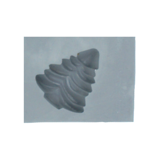 Close-up of small Christmas tree-shaped rubber mint mold with tiered branches for holiday candies