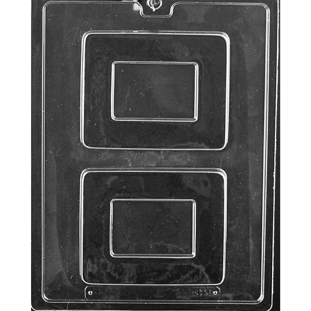 Clear plastic chocolate mold with two plain rectangular picture frame cavities, each with a raised outer border and an open center area, shown on a dark background.