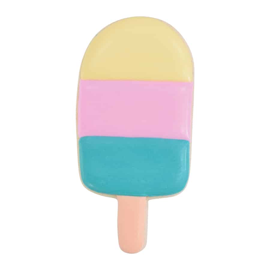 Decorated popsicle cookie with pastel yellow, pink, and blue icing, resembling a layered frozen treat.