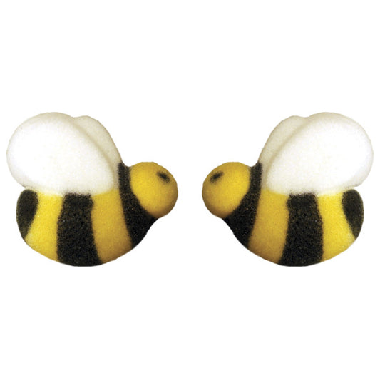 Pressed sugar decorations shaped like bumble bees with black and yellow stripes and white wings