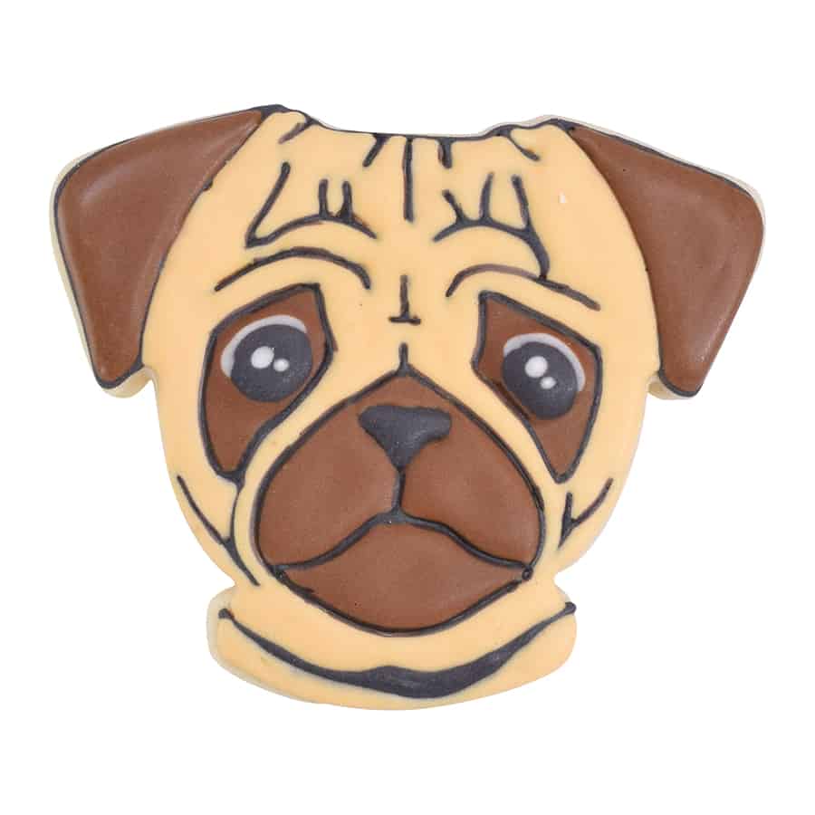 Decorated pug face cookie with tan and brown icing, featuring large expressive eyes and signature wrinkles.