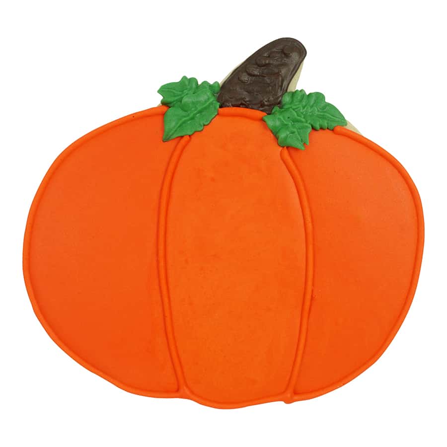 Decorated pumpkin cookie with orange icing, a brown stem, and green leaf details.