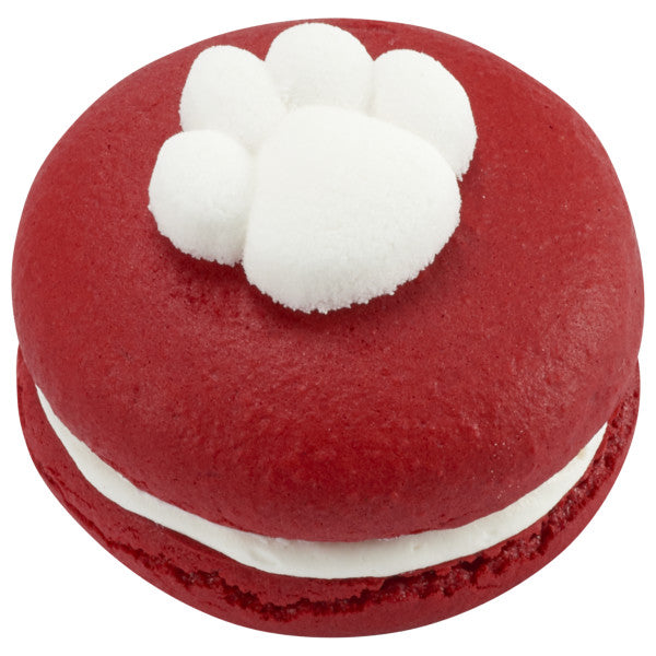 Red whoopie pie topped with a white pressed sugar puppy paw accent.