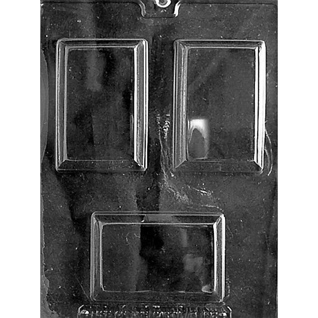 Clear plastic chocolate mold with three rectangular bar cavities, including two vertical bars and one horizontal bar, shown on a dark background.